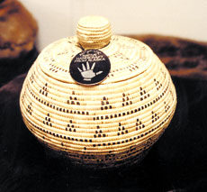Silver hand logo marks this basket as authentically Alaska Native made